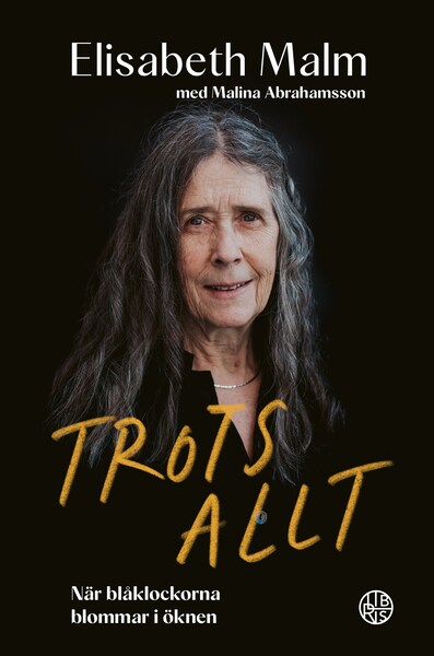 Omslaget till boken Trots allt med ett porträtt på författaren Elisabeth Malm.